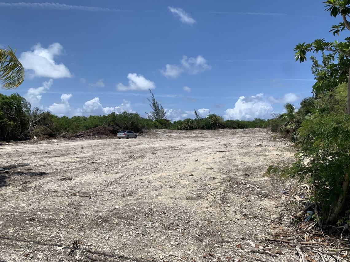 Cleared lot in Abaco before construction showing early stage of building process